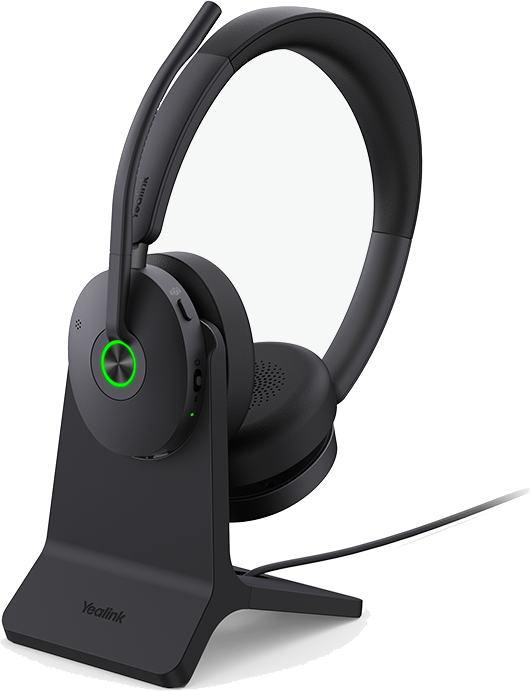 Yealink BH74 wireless headset on its charging stand
